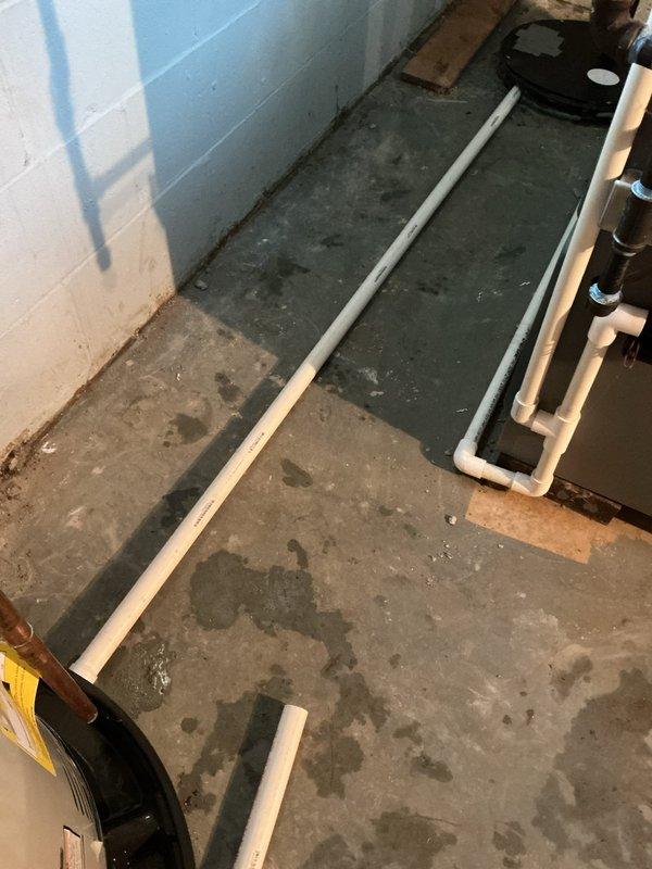Replaced failed 2018 Rheem 40-gallon short water heater with new Bradford White 40-gallon short unit featuring 6-year manufacturer warranty. Installation included thermal expansion tank, updated gas line shut-off valve, and new drain pan with discharge line routed to existing sump crock alongside furnace condensation drain. All plumbing connections completed with proper copper piping, pressure relief components, and code-compliant fittings. System tested and operational upon completion.