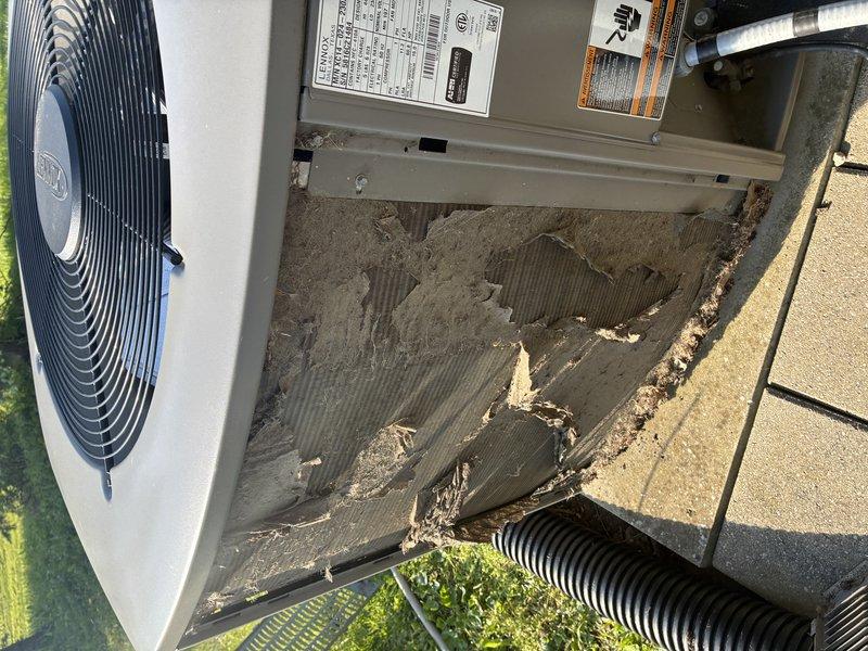 Completed standard air conditioning tune-up maintenance on outdoor condensing unit. Visual inspection revealed condenser coil showing moderate dirt accumulation and weathering consistent with normal outdoor exposure, with all fins intact and functional. Unit operational, and complimentary carbon monoxide detector provided to customer.