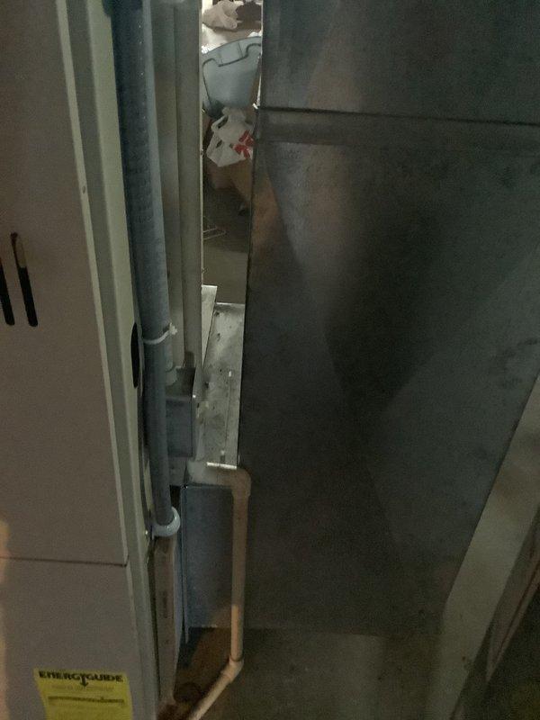 Conducted on-site evaluation for complete furnace and air conditioning system replacement at residential property. Assessed existing HVAC equipment location, ductwork configuration, and utility connections including plumbing and electrical access points in confined mechanical space to provide comprehensive replacement estimate.