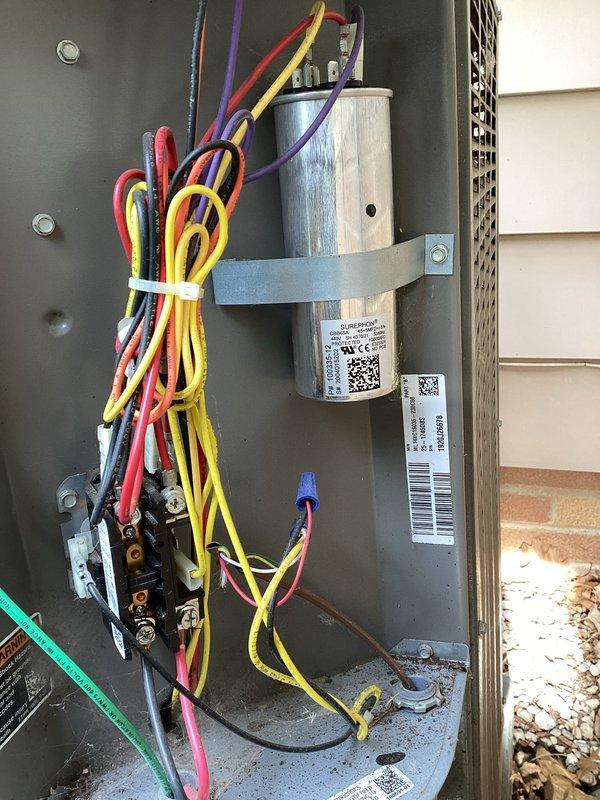 # HVAC Maintenance - Cooling

Performed preventive maintenance service on a 5-year-old air conditioning system for an MVP customer. Conducted comprehensive inspection of the outdoor condensing unit, including examination of the electrical control panel, capacitor, and wiring connections. Inspected indoor air handling components and ductwork system in the attic space, verifying proper insulation and airflow pathways. All electrical connections were secure, capacitor tested within normal parameters, and system components showed appropriate operational condition for the unit's age. Documentation photos captured for service records.