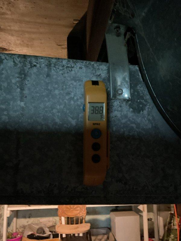 Completed preventive maintenance on air conditioning system. Performed temperature diagnostics on supply ductwork, recording 38.8°F at the main trunk line, confirming proper system cooling performance and adequate refrigerant charge.