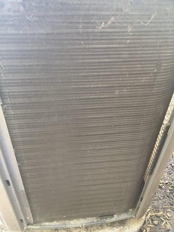 Completed scheduled cooling maintenance on 6-year-old HVAC system. Inspected outdoor condenser unit and found moderate accumulation of dust, debris, and organic material on heat exchanger fins. Verified indoor Lennox furnace and air handler components, checked PVC condensate drain lines and connections for proper operation. All system components operational and functioning within normal parameters.