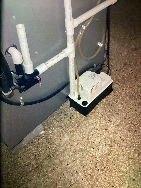 Completed MVP cooling maintenance visit on residential HVAC system. Inspected outdoor condensing unit and found deteriorated filter media with debris accumulation requiring cleaning. Verified proper operation of condensate pump assembly and drainage system in mechanical room, confirmed all PVC connections secure and pump functioning correctly.