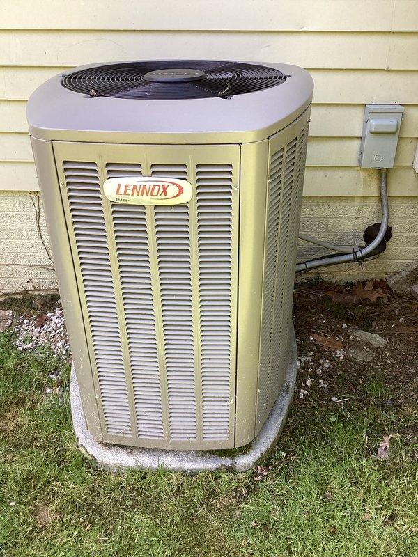Completed MVP cooling maintenance visit on Lennox outdoor condensing unit. Performed standard system inspection, verified proper operation of all components, and documented equipment condition with photographs showing unit in good working order with clean exterior surfaces and intact electrical disconnect with properly rated TR40R fuses. All safety checks passed and system operating within normal parameters.