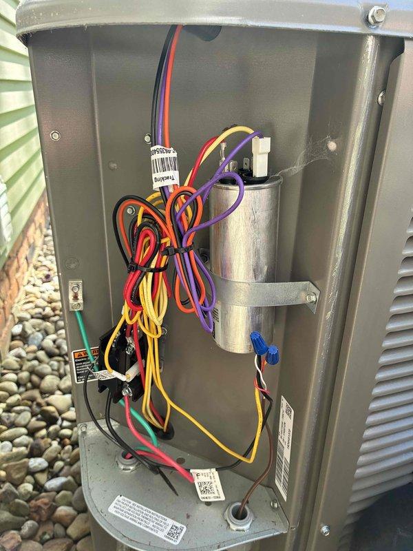 Completed MVP air conditioning maintenance service on residential cooling system. Inspected and verified clean pleated air filter with reinforced mesh construction properly installed in air handler unit. Performed electrical system inspection, checking capacitor, wire connections, and control terminals for proper operation and secure connections.