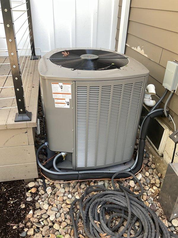 Responded to service call for recently installed split system air conditioning unit that failed initial inspection and was not providing adequate cooling to both zones. Upon arrival, performed comprehensive system evaluation of outdoor condensing unit and associated components. Identified and corrected installation deficiencies that prevented system from passing inspection. Verified proper refrigerant line connections, electrical connections, and condensate drainage. Tested system operation across both upstairs and downstairs zones, confirmed adequate airflow and temperature differential. System now operating within manufacturer specifications and cooling both zones effectively.
