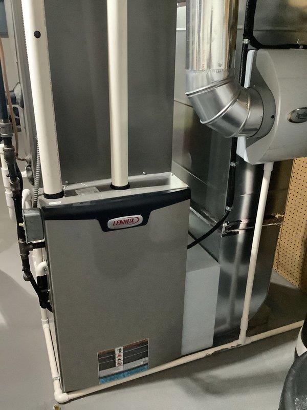 Completed annual maintenance visit for MVP customer with 1-year-old Lennox cooling system. Performed comprehensive inspection of outdoor condenser unit and indoor furnace/air handler, verified proper operation of all components, and documented system condition through photography. All equipment found operating within normal parameters with no issues identified at this time.