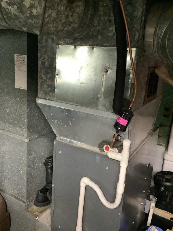 Completed comprehensive AC tune-up on 4-year-old Lennox system per seasonal maintenance special. Performed full system inspection including indoor air handler unit and outdoor condensing unit, verified all electrical connections, checked refrigerant levels and pressures, cleaned condenser coils, inspected ductwork connections, and tested thermostat operation. All components found operating within normal parameters with no deficiencies noted.