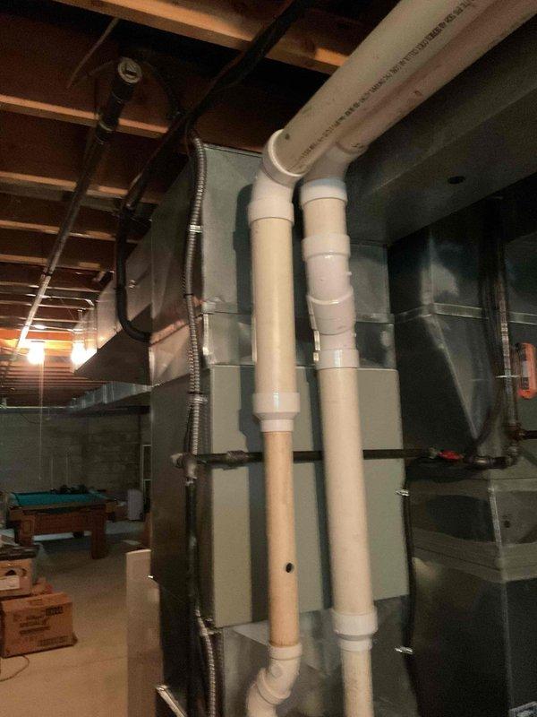 Completed MVP cooling maintenance visit on a 10+ year old outdoor condensing unit. Performed standard preventive maintenance procedures including inspection of the condenser unit exterior, verification of proper fan operation, and assessment of system components. Inspected indoor plumbing and drainage lines in basement area to ensure proper condensate removal and verify no leaks or blockages in the system. Unit operational and functioning within normal parameters upon completion of service visit.
