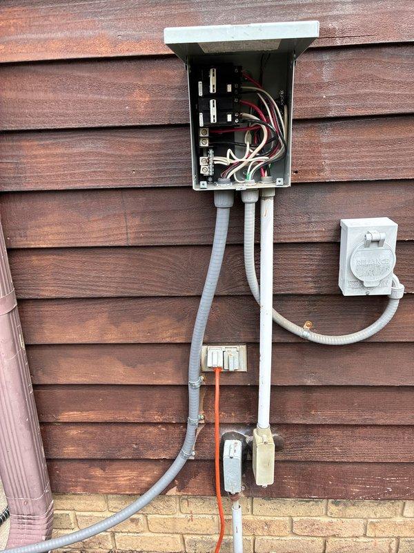 Disconnected electrical service to existing hot tub in preparation for replacement. Safely de-energized the dedicated 240V circuit at the exterior-mounted disconnect box, removed hot tub from power supply while maintaining all existing conduit runs and electrical infrastructure for future reconnection of new unit.