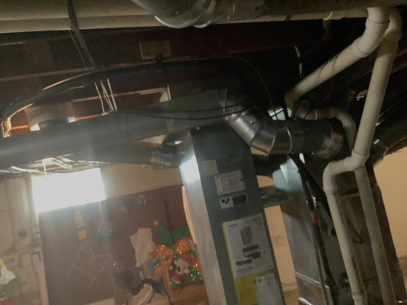 Completed relocation of outdoor condensing unit from original position to side of home. Coordinated electrical work prior to unit relocation, ordered and received necessary parts, then relocated unit to new concrete pad with proper stone base and reconnected all refrigerant lines, electrical connections, and condensate drainage to ensure proper system operation.