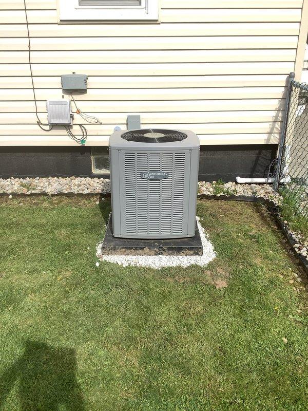 Completed relocation of outdoor condensing unit from original position to side of home. Coordinated electrical work prior to unit relocation, ordered and received necessary parts, then relocated unit to new concrete pad with proper stone base and reconnected all refrigerant lines, electrical connections, and condensate drainage to ensure proper system operation.