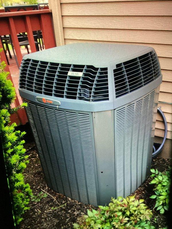 Completed preventive maintenance on 14-year-old residential air conditioning system for MVP customer. Inspected outdoor condenser unit, verified proper airflow through coils and louvers, and replaced air filter. All components operating within normal parameters at time of service.