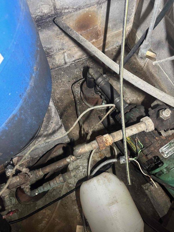 Completed electrical warranty work to address failed inspection items. Installed grounding electrode conductor (GEC) to well casing per code requirements, bonded water softener and water heater with proper jumper connections to maintain electrical continuity in plumbing system, and applied code-compliant paint to exposed gas lines for corrosion protection and identification purposes.