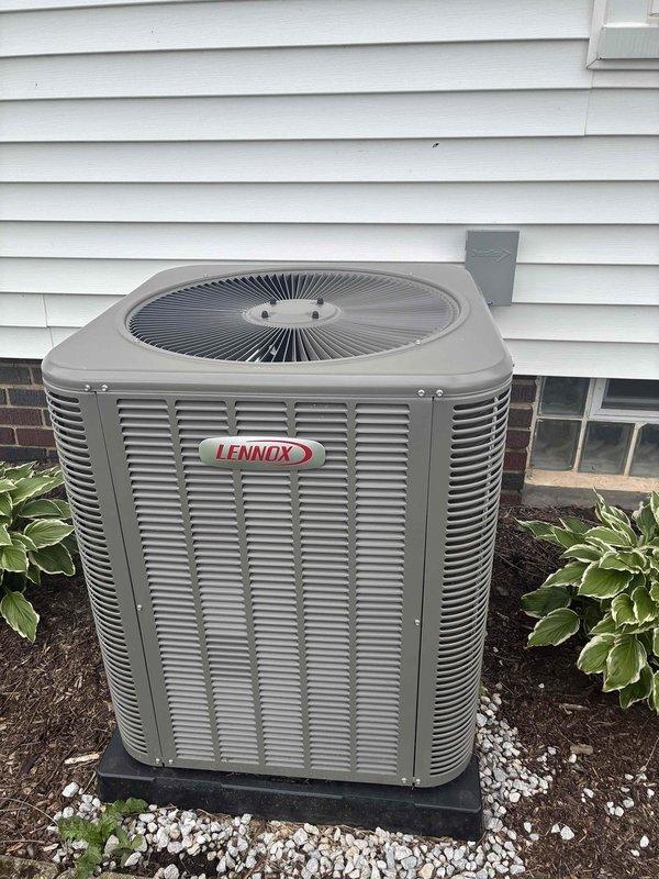 Completed scheduled MVP cooling maintenance visit on 2-year-old Lennox air conditioning system. Performed comprehensive inspection of outdoor condensing unit, including removal of access panel to examine electrical components, wiring connections, capacitors, and relays. All electrical connections found secure with proper color-coded wiring intact. Unit operating within normal parameters with no deficiencies noted during inspection.