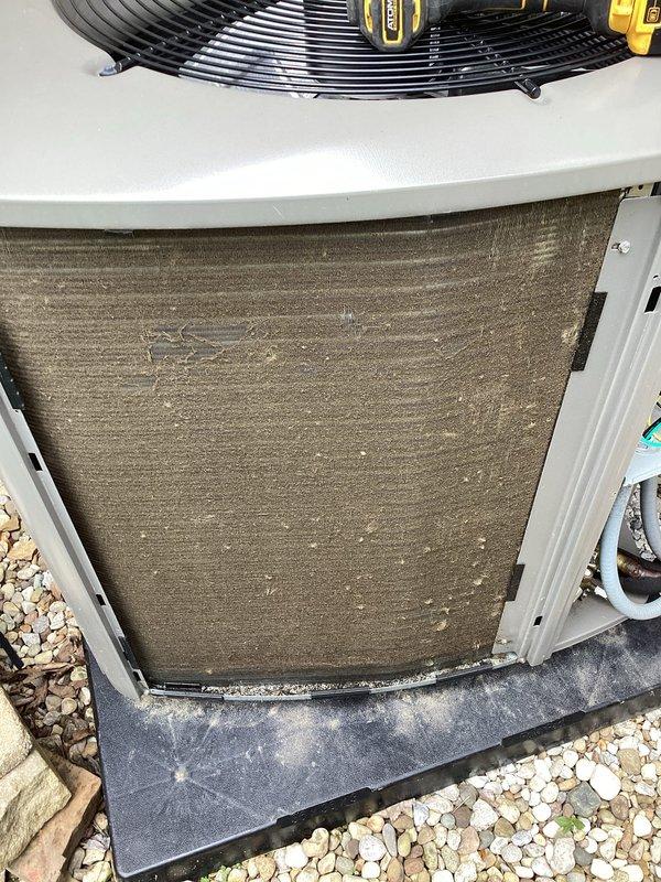 Completed annual maintenance on one-year-old air conditioning system under MVP plan. Performed standard maintenance procedures including system inspection, temperature and pressure readings, and operational testing. Unit showed significant dirt and debris accumulation on outdoor coil requiring cleaning to maintain optimal efficiency and airflow.