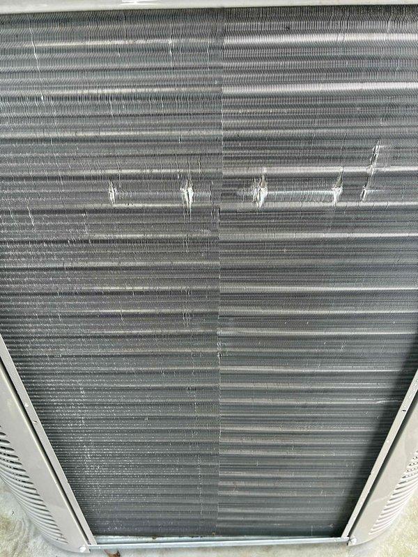 Completed comprehensive tune-up service including chemical wash of evaporator coil due to insufficient cooling on previous visit. The coil exhibited heavy accumulation of dust and debris that was restricting airflow and reducing system efficiency. Applied chemical cleaning solution to thoroughly clean the coil fins and restore proper heat transfer capability, ensuring optimal cooling performance and system operation.