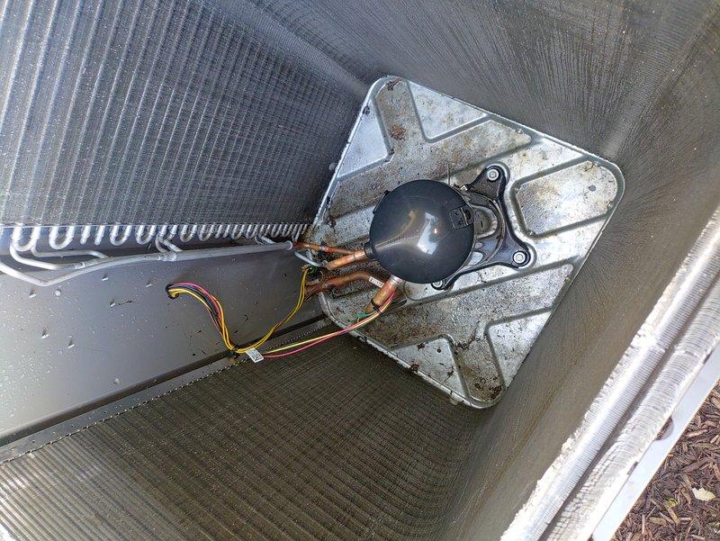 Completed spring maintenance service on two-year-old residential cooling system. Performed comprehensive inspection of air handler unit and condensate management components, including condensate pump with copper tubing connections and electrical wiring verification. Inspected drain pan condition, noting normal weathering consistent with system age, and confirmed proper operation of all drainage components. Verified air handler installation, ductwork connections, PVC condensate lines, and electrical connections throughout system. All components found operating within normal parameters with no immediate service requirements identified.