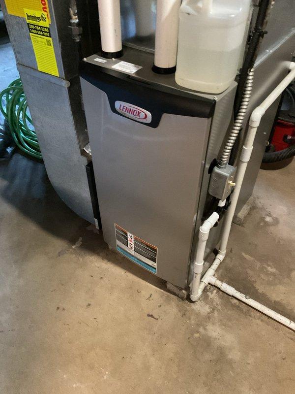 Completed comprehensive AC tune-up on residential Lennox HVAC system, including inspection of furnace cabinet, ductwork connections, and PVC condensate drainage lines. Installed complimentary carbon monoxide detector and verified all system components were operating within normal parameters.