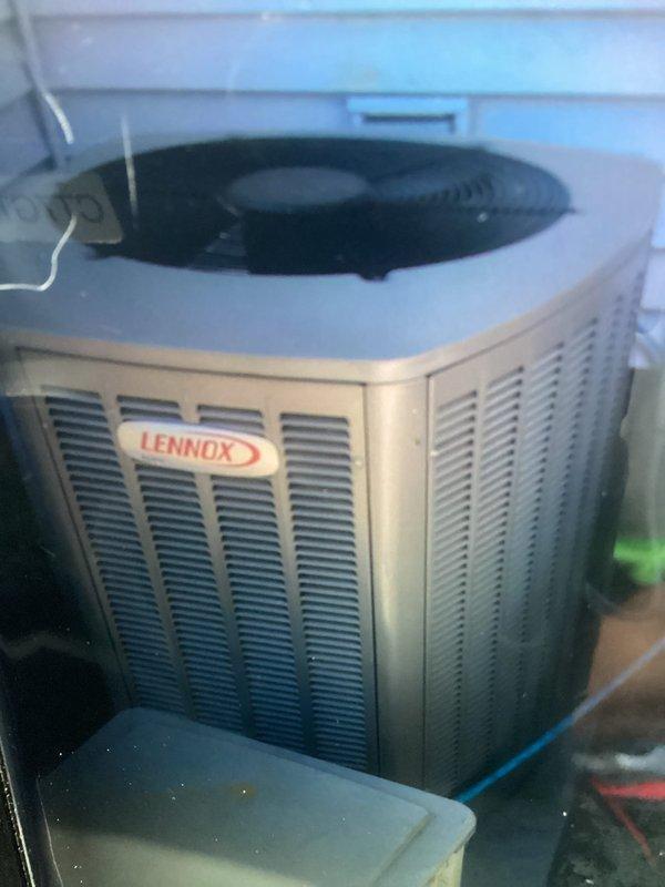 Completed comprehensive AC tune-up on 5-year-old Lennox cooling system. Performed full preventive maintenance including inspection of indoor air handler and outdoor condenser unit, checked refrigerant levels and pressures, cleaned condenser coils, verified electrical connections, tested thermostat operation, and inspected all ductwork connections. System operating within manufacturer specifications with no issues identified; all components functioning properly and unit ready for cooling season.