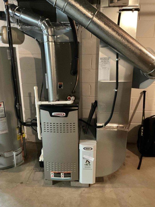 Completed scheduled MVP Cooling Visit maintenance service on residential HVAC system, including inspection and servicing of Lennox furnace unit in basement and Bryant outdoor condensing unit. Both systems were evaluated for proper operation, with photo documentation captured of equipment condition and installation setup.