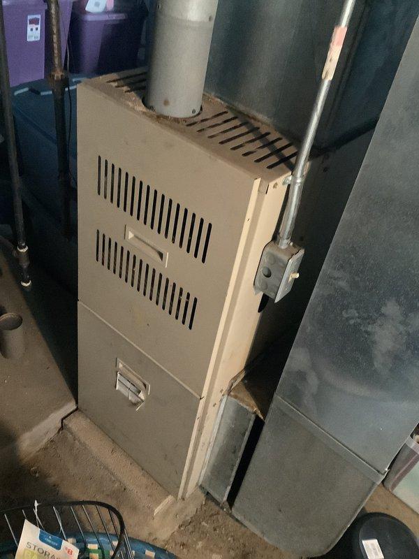 Conducted estimate for complete furnace and air conditioning system replacement at residential property. Evaluated existing basement-installed furnace unit and ductwork configuration, documented current HVAC equipment condition and discussed BOGO promotional pricing for new system installation. Property currently has no air conditioning system; provided comprehensive quote for matched heating and cooling equipment replacement.