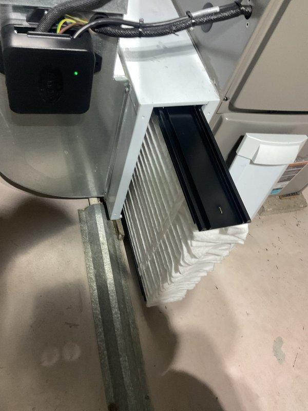 Completed MVP maintenance on air conditioning system and performed thorough inspection following ice damage to outdoor unit. Inspected indoor air handler, verified proper operation of blower assembly, checked filter condition, tested electrical components including time-delay fuses rated at 30A, and confirmed all safety controls were functioning correctly. System operating within normal parameters with no issues detected from ice impact.