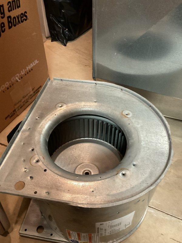 Responded to service call for 10-year-old AC unit making unusual noise and failing to circulate air throughout the residence. Upon inspection, diagnosed failed blower motor assembly as the source of the noise and airflow issue. Removed and replaced the defective blower motor and squirrel cage wheel assembly, restoring proper airflow to all vents. System tested successfully upon completion with normal operation confirmed.