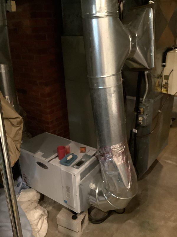 Completed installation of 90% efficiency furnace with S40 thermostat and Smart Room Sensor 2410. Reconnected existing dehumidifier and humidifier units to new system, ensuring proper electrical and plumbing integration. Performed comprehensive ductwork repairs throughout basement, applying mastic sealant to all exposed seams and joints to eliminate air leakage and improve system efficiency. All equipment tested and confirmed operational upon completion.