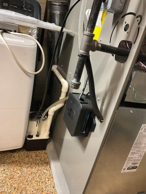 Completed routine preventative maintenance on residential air conditioning system. Performed comprehensive inspection of indoor air handler unit, including condensate drainage system with pump assembly and associated piping connections. Verified proper operation of condensate removal equipment and confirmed all drain lines, fittings, and clamps were secure with no signs of leakage. Inspected mechanical components, electrical connections, and control panels for proper function. Measured and recorded system operating temperature at 57°F, confirming adequate cooling performance. All equipment found operating within normal parameters with no deficiencies noted.