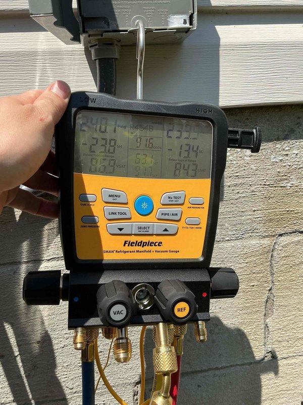 Responded to no cooling complaint on recently installed air conditioning system that was also producing abnormal noises. Upon arrival, unit was shut down by customer. Performed diagnostic testing using refrigerant manifold gauges and clamp meter to assess system operation and electrical components. Inspected capacitor, contactor, and associated wiring connections within outdoor unit. Measured system temperatures and pressures, with readings indicating superheat and subcooling values of 240.1°F and 238°F respectively during testing phase. Verified proper electrical connections to capacitor and contactor assembly, checked for loose wiring or failed components that could cause unusual sounds. System evaluated under MVP membership, no additional treatment authorized at this time.