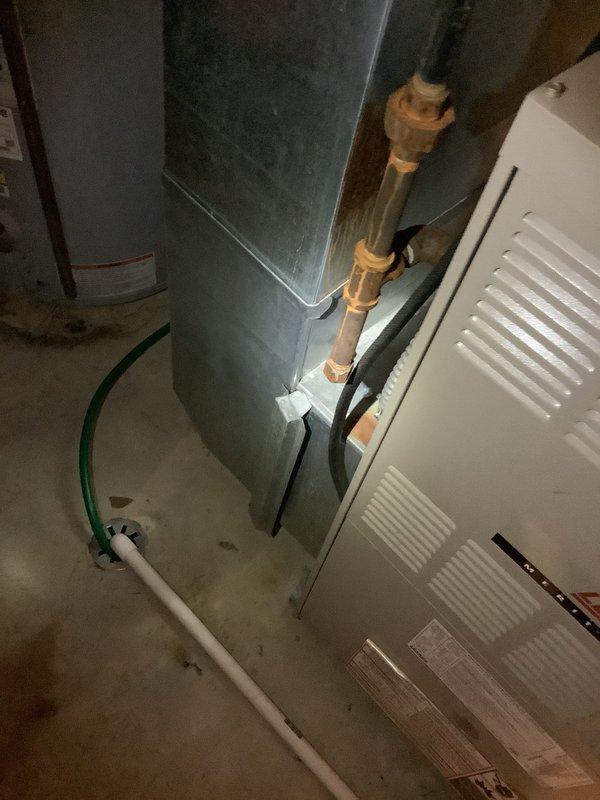 Conducted comprehensive site assessment for HVAC system replacement on 21-year-old existing unit currently in operational condition. Performed detailed inspection of basement-mounted air handler, refrigerant line configuration, and associated ductwork components. Evaluated attic space for proper ventilation, existing duct routing, and structural considerations for new equipment installation. Documented current system layout including copper refrigerant lines with insulation, PVC condensate drainage, and electrical service requirements. Provided replacement system recommendations and prepared detailed estimate for complete HVAC system upgrade.