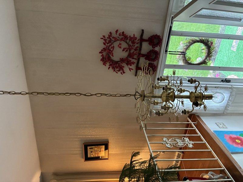 Responded to emergency service call for damaged chandelier fixture where socket was pulled from ceiling mounting. Assessed structural damage to electrical box and ceiling junction, secured wiring connections, and reinstalled fixture hardware. Verified proper grounding and tested fixture operation to ensure safe functionality upon completion.