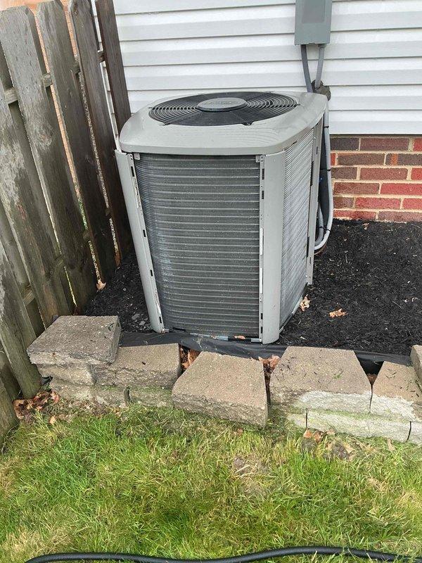 Completed MVP cooling maintenance visit on residential Lennox air conditioning system. Performed comprehensive inspection of outdoor condenser unit, checked electrical connections at disconnect box, and verified proper operation of all components. Unit found in good working condition with adequate clearance from fence line and proper mounting on concrete pad foundation.