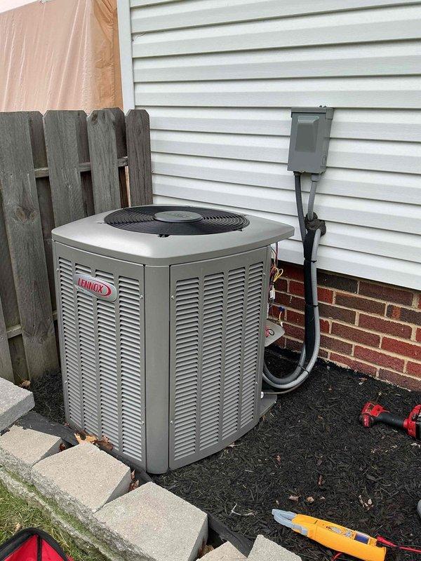 Completed MVP cooling maintenance visit on residential Lennox air conditioning system. Performed comprehensive inspection of outdoor condenser unit, checked electrical connections at disconnect box, and verified proper operation of all components. Unit found in good working condition with adequate clearance from fence line and proper mounting on concrete pad foundation.