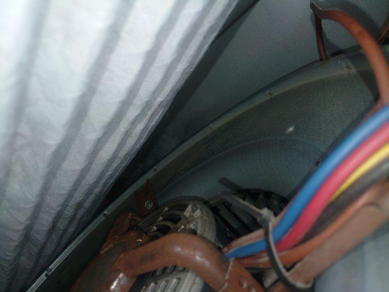 Responded to no cooling complaint on 31-year-old residential air conditioning system installed in the 1990s. Upon inspection, found aging HVAC equipment located in attic space with original copper refrigerant lines, condensate drainage system, and air handler unit showing significant age-related wear. Documented existing system configuration including insulated refrigerant linesets, PVC condensate piping, and ductwork connections. Given the advanced age of the equipment beyond its expected service life, advised customer that system has reached end of useful operation and replacement should be considered for reliable cooling performance.