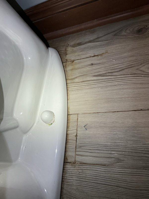 Responded to service call for toilet experiencing squealing noise and water leakage at the base. Upon inspection, identified faulty fill valve causing the squealing sound and compromised wax ring seal resulting in water seepage around the toilet base onto the wood flooring. Replaced the defective fill valve assembly and installed new wax ring seal, ensuring proper toilet mounting and secure connection to the flange. Reconnected the braided stainless steel supply line to the shut-off valve, tested system operation, and confirmed elimination of both the squealing noise and base leakage.