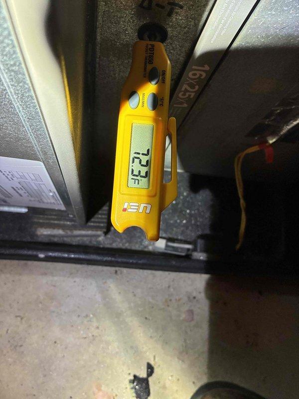 Completed comprehensive cooling maintenance for residential HVAC system. Performed diagnostic temperature measurements throughout the ductwork system, recording readings of 27.2°F at the evaporator coil to verify proper cooling performance. Inspected outdoor condenser unit and noted significant dirt and debris accumulation on mesh panels and coil surfaces, which can restrict airflow and reduce system efficiency. Unit is operational but would benefit from coil cleaning during next service visit to maintain optimal performance.