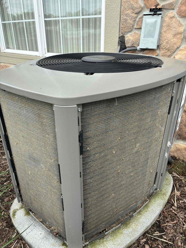 Completed comprehensive cooling maintenance for residential HVAC system. Performed diagnostic temperature measurements throughout the ductwork system, recording readings of 27.2°F at the evaporator coil to verify proper cooling performance. Inspected outdoor condenser unit and noted significant dirt and debris accumulation on mesh panels and coil surfaces, which can restrict airflow and reduce system efficiency. Unit is operational but would benefit from coil cleaning during next service visit to maintain optimal performance.