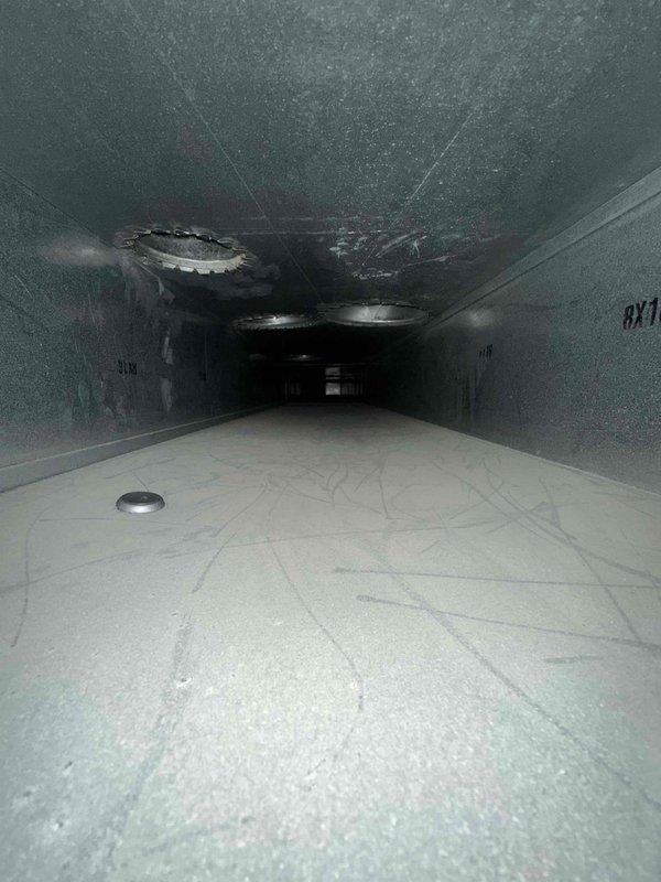 Completed comprehensive duct cleaning service for residential HVAC system. Thoroughly cleaned main rectangular supply duct showing significant accumulation of dust, debris, and contaminants on interior surfaces, walls, and ceiling. Cleaned flexible cylindrical branch ducts with ribbed construction, removing buildup and ensuring proper airflow throughout the ventilation system. All ductwork components inspected and cleaned to restore optimal air quality and system efficiency.