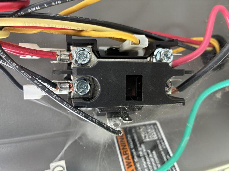 Performed routine maintenance on a two-year-old air conditioning system. Conducted electrical diagnostics using a digital multimeter to verify proper voltage and amperage at the unit's terminal connections. Inspected and tested all electrical connections at the terminal block, confirming secure wire terminations across all control and power circuits. Examined air filter condition and overall system operation to ensure optimal cooling performance.