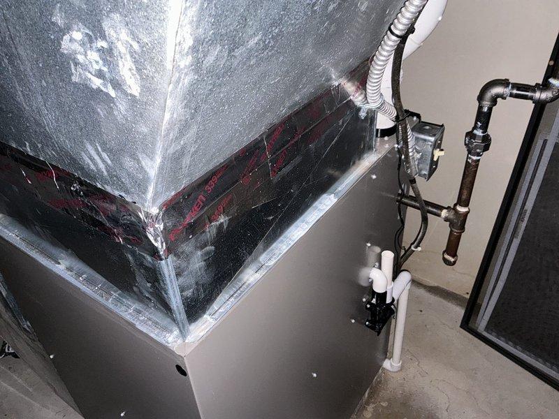 Responded to no cooling complaint on 9-year-old Concord system. Performed diagnostic evaluation and leak search on refrigerant circuit, confirming system was completely depleted with no refrigerant charge remaining. Documented existing equipment condition including outdoor condensing unit and indoor air handler with proper insulation wrapping and condensate drainage configuration. Provided comprehensive replacement estimates for new HVAC system due to age of equipment and extent of refrigerant loss making repair economically unfavorable.