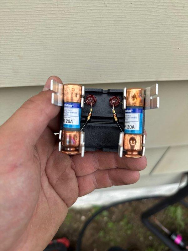 Completed installation of 80% AFUE gas furnace and air conditioning system. Installed new outdoor condensing unit with proper refrigerant line connections utilizing brass service valves with foam insulation for temperature control and condensation prevention. Mounted line set securely to exterior wall using metal bracket assembly. Verified proper electrical connections and replaced 20-amp fuses in disconnect box to ensure safe operation of new equipment. All refrigerant lines properly insulated and secured, system tested and operational.