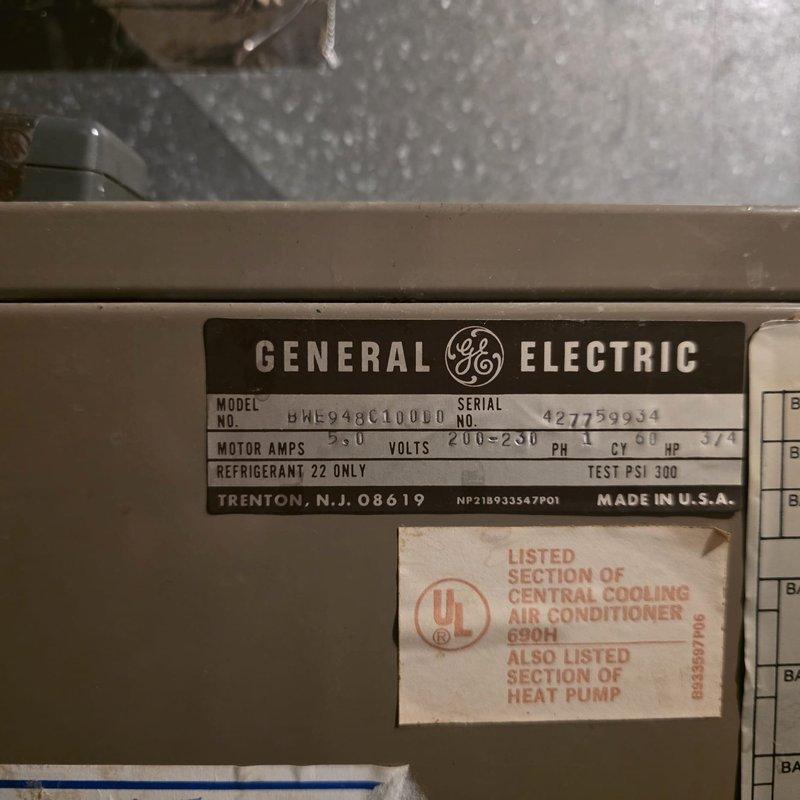 Responded to service call for 16-year-old General Electric heat pump unit experiencing frozen refrigerant lines and loss of cooling capacity. Upon inspection, identified unit utilizing R-22 refrigerant system with significant electrical connection corrosion and deterioration at outdoor unit. Documented equipment condition including heavily rusted electrical connector assembly showing evidence of prolonged moisture exposure, which likely contributed to system performance issues and potential electrical safety concerns requiring immediate attention.