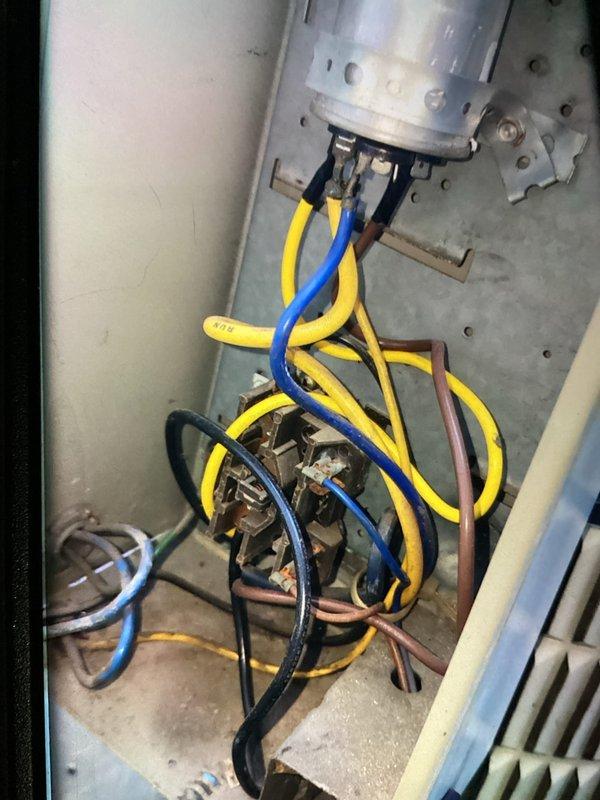 Responded to no-cooling call where AC system and blower motor were completely inoperative. Upon inspection, diagnosed failed contactor preventing compressor and blower operation. Replaced defective contactor, verified all electrical connections at terminal block, and confirmed proper voltage to compressor motor. Tested system operation and restored full cooling functionality with blower running properly.