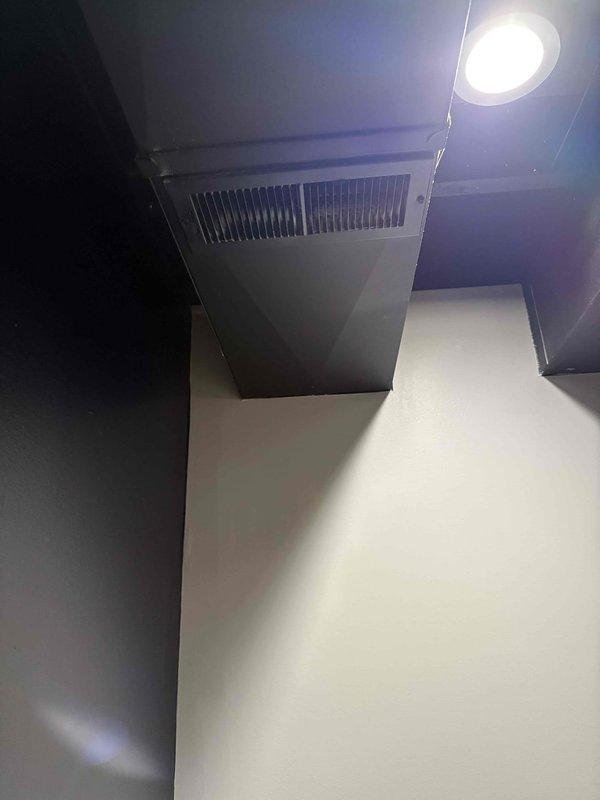 Conducted on-site consultation and assessment for Mitsubishi ductless mini-split system installation in new room addition. Evaluated existing HVAC infrastructure in basement mechanical room, documented current furnace and ductwork configuration, and assessed electrical capacity for new system. Photographed proposed installation area including ceiling penetration points and determined optimal indoor unit placement for adequate cooling coverage of the new living space.