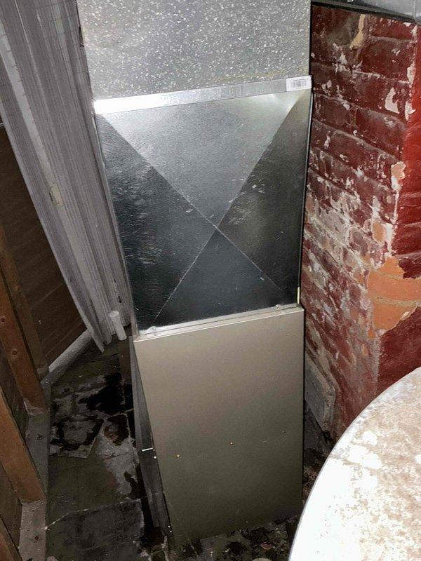 Conducted on-site assessment for air conditioning system installation to complement recently installed furnace and ductwork. Evaluated existing HVAC air handler unit located in basement utility area, inspected electrical panel capacity for AC condenser requirements, and documented current equipment configuration. Noted existing moisture issues on floor near equipment and deteriorating wall conditions that may require attention during installation to ensure proper system performance and longevity.
