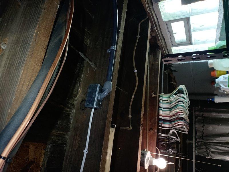 Installed dedicated AC circuit and power whip for outdoor condensing unit. Ran electrical wiring through attic space to exterior wall location, securing copper conductors to structural framing per code requirements. Terminated circuit at exterior disconnect and connected power supply to AC unit positioned on concrete pad. Verified proper voltage, tested circuit operation, and confirmed unit functionality upon energization.