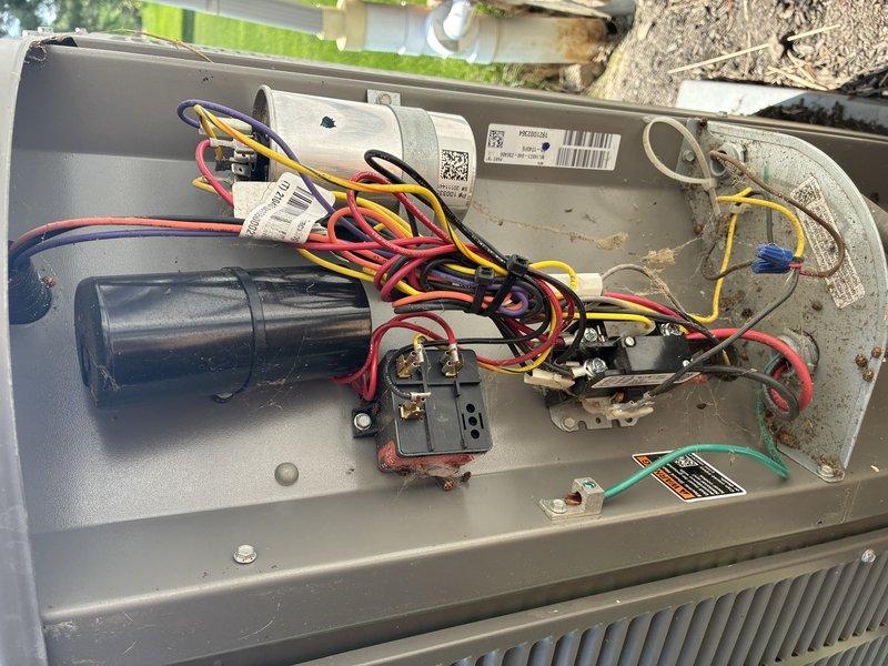 Completed scheduled preventive maintenance on a 5-year-old air conditioning system. Performed comprehensive system inspection including electrical measurements using clamp meter to verify proper amperage draw and voltage levels. Accessed interior components by removing top panel, inspected all wiring connections, capacitor, and motor housing for signs of wear or damage. All electrical connections were secure with proper wire routing observed. System components showed normal operational wear consistent with age, with some accumulated dust and surface grime noted on interior surfaces. Unit operating within normal parameters with no immediate repairs required.