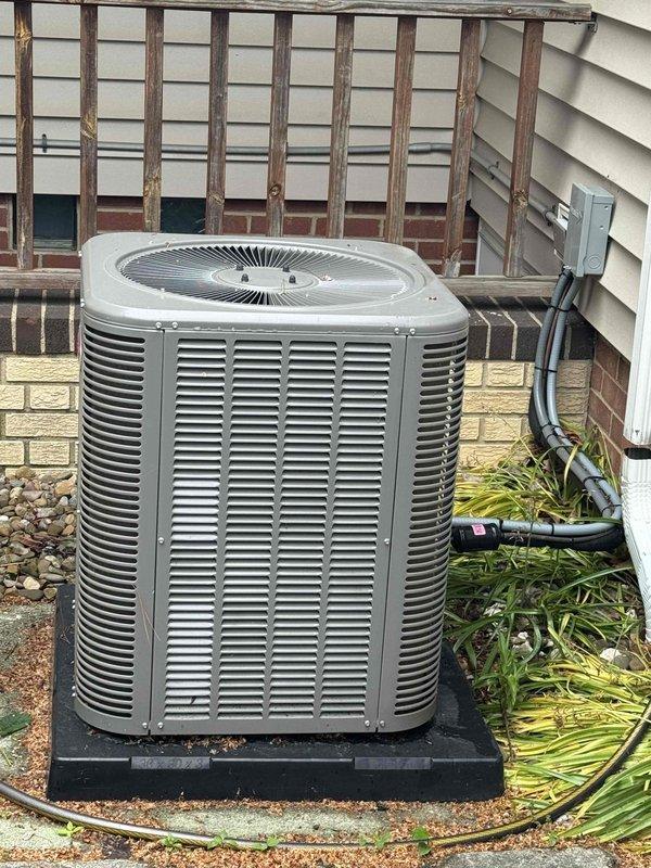 Completed MVP recurring cooling maintenance visit on residential HVAC system. Inspected and serviced Goodman forced air furnace (Model TUD1B080A9241AB, manufactured January 2014) and outdoor condensing unit. Performed standard preventive maintenance procedures including visual inspection of equipment condition, verification of proper operation, and documentation of system specifications. Both indoor and outdoor units found in satisfactory working condition with no immediate service needs identified.